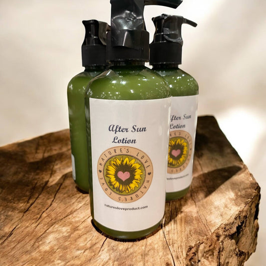 Three green bottles of After Sun Lotion with Nature's Love label on a rustic wooden surface