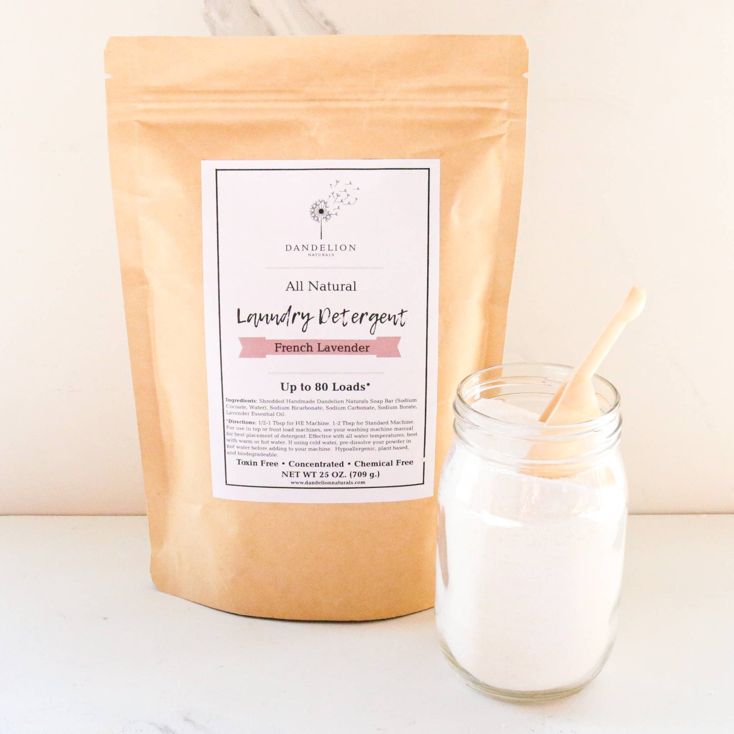 All natural French Lavender laundry detergent powder in kraft paper bag with glass jar and scoop